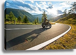 Постер Motorcycle driver riding in Alpine highway, Nockalmstrasse, Austria, Europe.