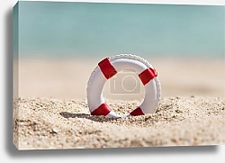 Постер Спасательный круг на песке