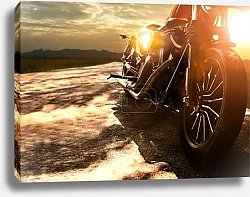 Постер Retro motorcycle traveling on country road against beautiful