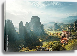Постер Греция. Meteora monasteries in a sunny daylight Постер Греция. Meteora monasteries in a sunny daylight
