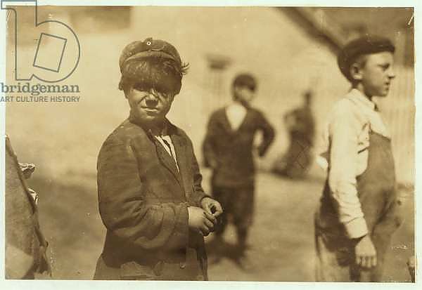 Joe Mello, aged 8 or 9 works as a mill sweeper in New Bedford, Massachusetts, 1911.