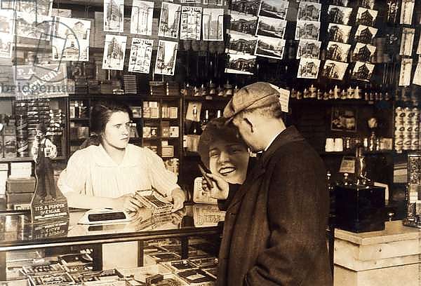 Mary Creed, aged 14, selling cigars, c.1930