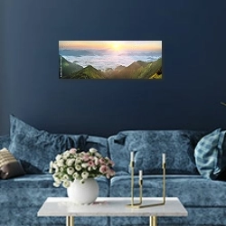 «Рассвет над морем тумана 2» в интерьере стильной синей гостиной над диваном