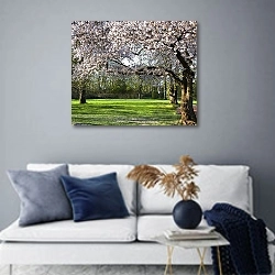 «Деревья в цвету» в интерьере современной гостиной в синих тонах