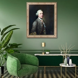 «Портерт мужчины» в интерьере гостиной в зеленых тонах