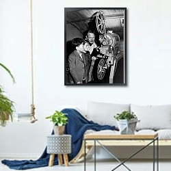 «История в черно-белых фото 464» в интерьере гостиной в скандинавском стиле над диваном