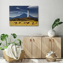 «Мыс Эгмонт, Новая Зеландия. Коровы на пастбище около маяка» в интерьере современной комнаты над комодом