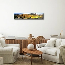 «Осень в горах» в интерьере современной светлой гостиной над комодом