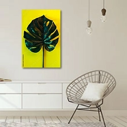 «Большой зеленый лист на ярко-желтом фоне» в интерьере белой комнаты в скандинавском стиле над комодом