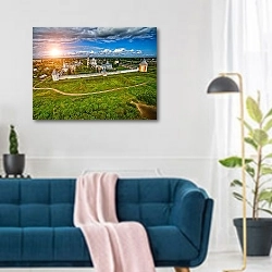 «Россия. Спасо-Прилуцкий монастырь» в интерьере современной гостиной над синим диваном