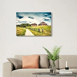 «Деревенские дома» в интерьере современной светлой гостиной над диваном