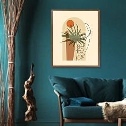 «Мужской силуэт на фоне тропиков» в интерьере зеленой гостиной в этническом стиле над диваном