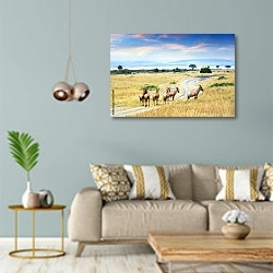 «Антилопы в африканской саванне» в интерьере современной гостиной с голубыми стенами