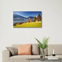«Швейцария. Зимний пейзаж на озере Тун» в интерьере современной светлой гостиной над диваном