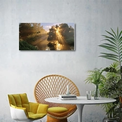 «Московская область, Россия. Утреннее солнце» в интерьере современной гостиной с желтым креслом