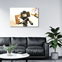 «Photo of food on camera» в интерьере офиса в зоне отдыха над диваном