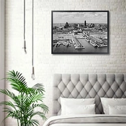 «История в черно-белых фото 356» в интерьере спальни в скандинавском стиле над кроватью