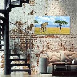 «Леопард идет по саванне» в интерьере двухярусной гостиной в стиле лофт с кирпичной стеной