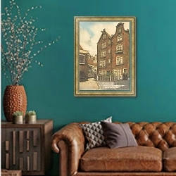 «Bagijnhofje» в интерьере гостиной с зеленой стеной над диваном