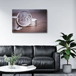 «Современные рубли» в интерьере офиса в зоне отдыха над диваном