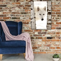 «Белый волк между берёз» в интерьере в стиле лофт с кирпичной стеной и синим креслом