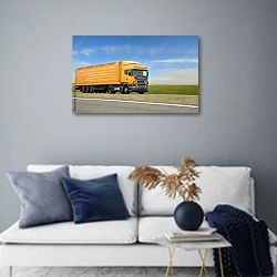 «Оранжевый грузовик с трейлером» в интерьере современной гостиной в синих тонах