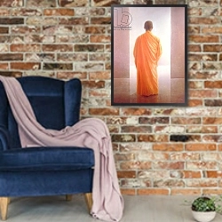 «Young Monk, back view, Vietnam» в интерьере в стиле лофт с кирпичной стеной и синим креслом