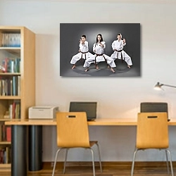 «Занятия каратэ для подростков» в интерьере офиса над рабочими столами сотрудников