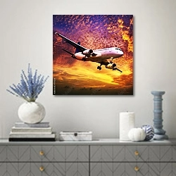 «Самолет в небе на закате» в интерьере современной гостиной с голубыми деталями