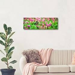 «Жёлтая бабочка в поле розовых цветов» в интерьере современной светлой гостиной над диваном