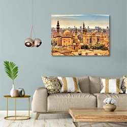«Вид мечетей султана Хасана и Аль-Рифаи в Каире, Египет» в интерьере современной гостиной с голубыми стенами