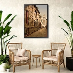 «Тунис. Улица Сиди-Бен-Зиад» в интерьере комнаты в стиле ретро с плетеными креслами