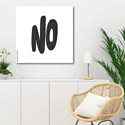 «Нет» в интерьере гостиной в скандинавском стиле над комодом