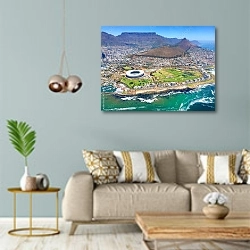 « Кейптаун, вид сверху» в интерьере современной гостиной с голубыми стенами
