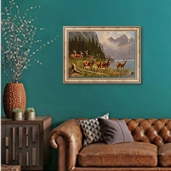 «Red Deer on the Lakeside, signed, dated MMüller Munich» в интерьере гостиной с зеленой стеной над диваном