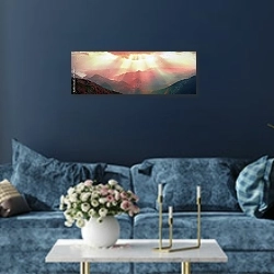 «Горы в лучах солнца» в интерьере стильной синей гостиной над диваном