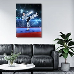 «Профессиональная каратистка» в интерьере офиса в зоне отдыха над диваном