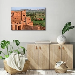 « Старый поселок в Атласских горах на закате, Марокко» в интерьере современной комнаты над комодом