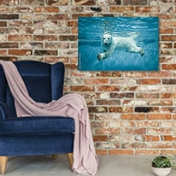 «Белый медведь под водой» в интерьере в стиле лофт с кирпичной стеной и синим креслом