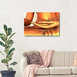 «Буддийская статуя» в интерьере современной светлой гостиной над диваном