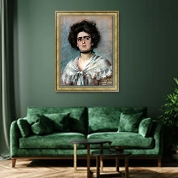 «Лаура в фишу» в интерьере зеленой гостиной над диваном