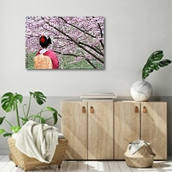 «Гейша и цветущее дерево сакуры» в интерьере современной комнаты над комодом
