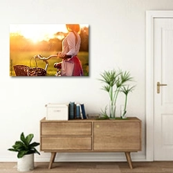 «Девушка с велосипедом» в интерьере современной прихожей над тумбой