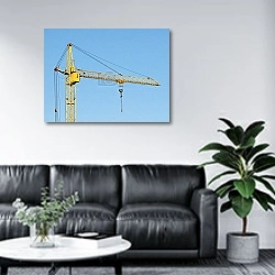 «Строительный кран крупным планом» в интерьере офиса в зоне отдыха над диваном