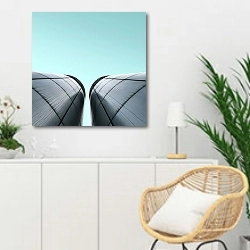 «Две цистерны на фоне неба» в интерьере гостиной в скандинавском стиле над комодом