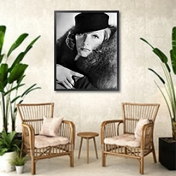 «Гарбо Грета 67» в интерьере комнаты в стиле ретро с плетеными креслами