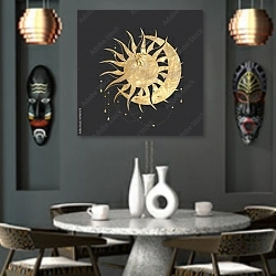 «Золотые солнце и луна» в интерьере в этническом стиле над столом