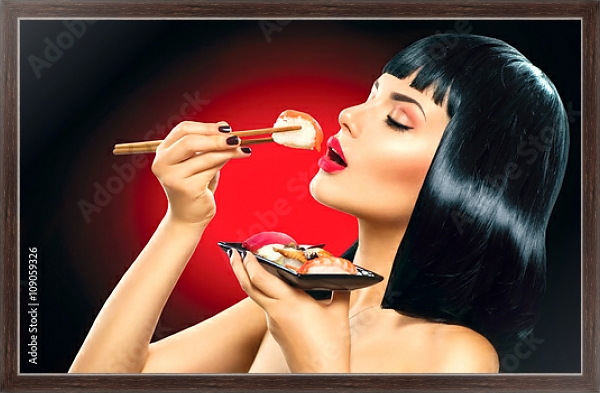 Постер Девушка ест суши с типом исполнения На холсте в раме в багетной раме 221-02