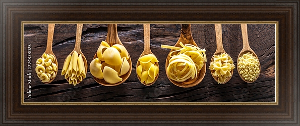 Постер Виды макарон в деревянных ложках на столе с типом исполнения На холсте в раме в багетной раме 1.023.151