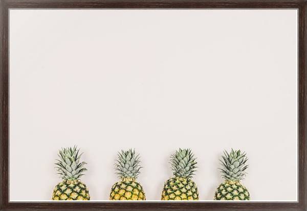 Постер Четыре ананаса на розовом фоне с типом исполнения На холсте в раме в багетной раме 221-02